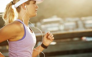 woman listening to music and running