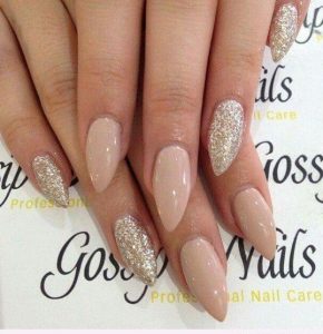 almond nude glitter manicure