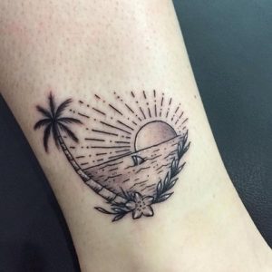 τατουαζ με φοινικα και ηλιο